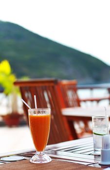 A patio and chairs in tropical resort