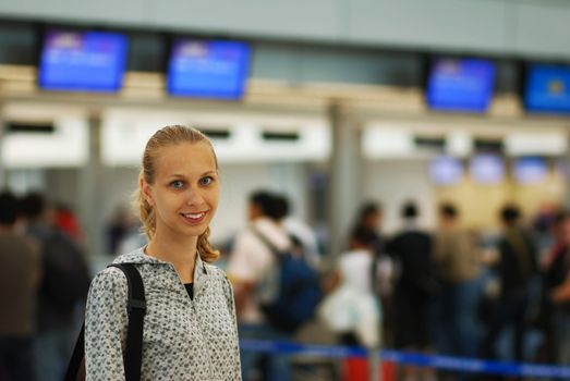 Woman at the airport, shallow DOF