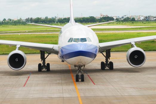 Airplane is taxing in airport getting ready to fly