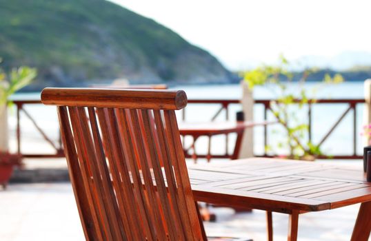 A patio and chairs in tropical resort