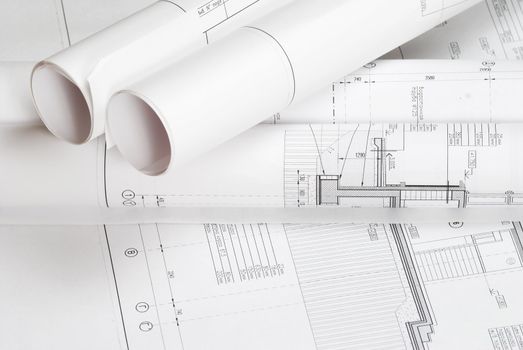 House plan blueprints roled up 