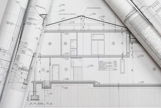 House plan blueprints roled up 