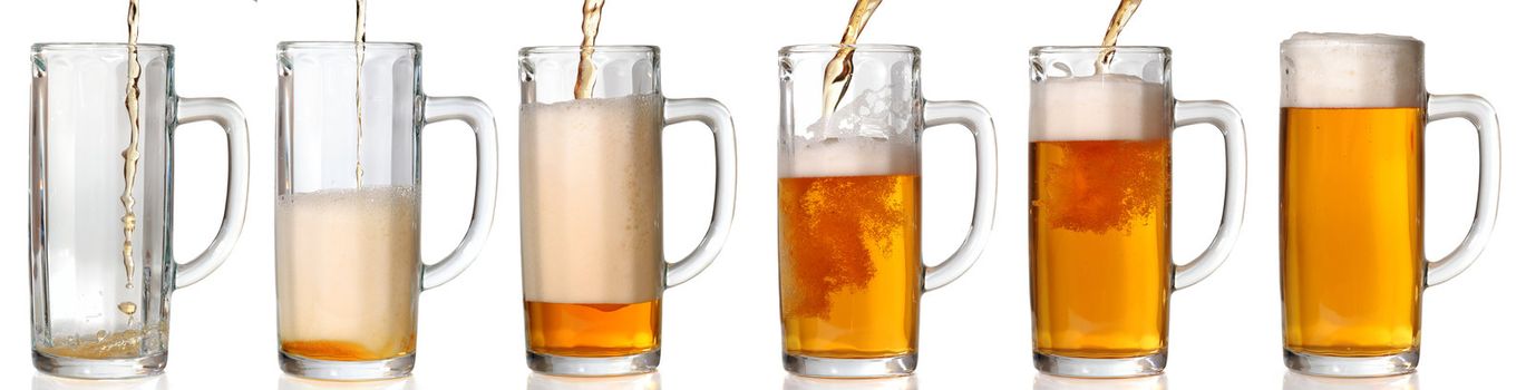 Beer mug isolated on white. Pouring beer in it. 43 Mpxls.