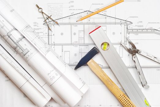 Tools over house plan blueprints