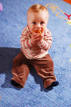 Cute little baby on the floor