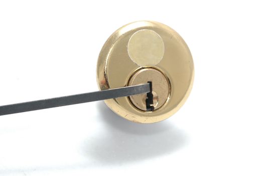 Picking a pin-tumbler lock with a tension wrench