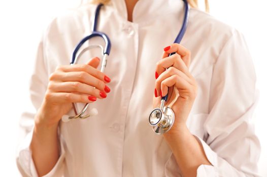 Doctor with stethoscope isolated on white