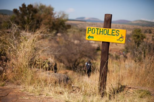 'Potholes' sign at Bourke's Luck Potholes, Mpumalenga, South Africa