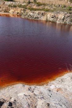 Polluted water pond in the abandoned mine of Lousal, Grandola, Portugal