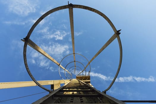 High up view inside an industrial service ladder