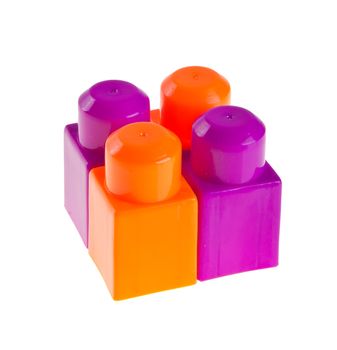 Plastic building blocks on a background