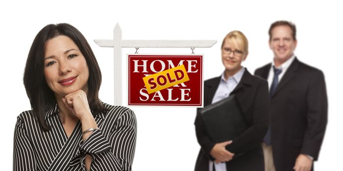 Mixed Race People with Sold Home For Sale Real Estate Sign Isolated on a White Background.