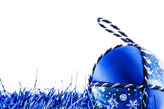 Italy. Traditional handmade Christmas ball made of white and blue fabric