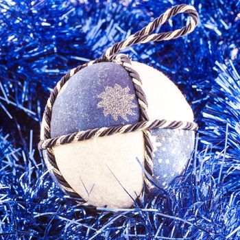 Italy. Traditional handmade Christmas balls made of white and blue fabric
