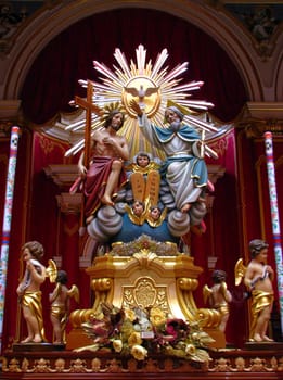 A statue representing The Holy Trinity on display in Marsa, Malta.