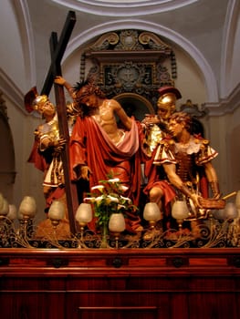 The statue representing The Tenth Station of The Cross when Jesus is stripped of His garments.