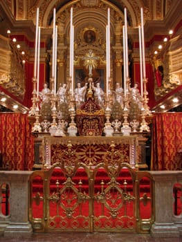 The Main Altar of the church in Zurrieq, Malta richly decorated during the feast of Saint Catherine.
