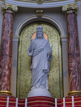 A marble statue of Christ The King in Paola, Malta.