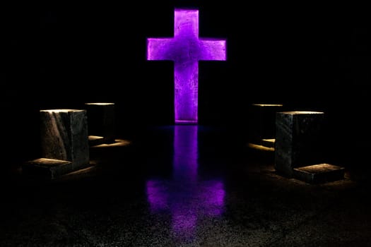 A purple lit cross in the salt cathedral in Zipaquira, Colombia.