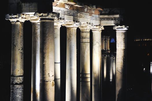 Roman columns light up in the dark night