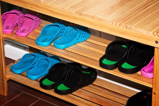 Shoe racks and Set in front of the bathroom.