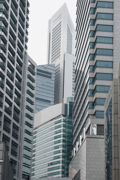 Cramped modern skyscraper architecture jungle of glass, metal and concrete