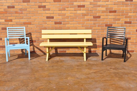 Colorful wooden chairs on various background, can be use for background or prints