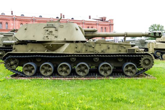 Vintage Russian military vehicle on green grass taken on a sunny day can be use for various background and military usage.