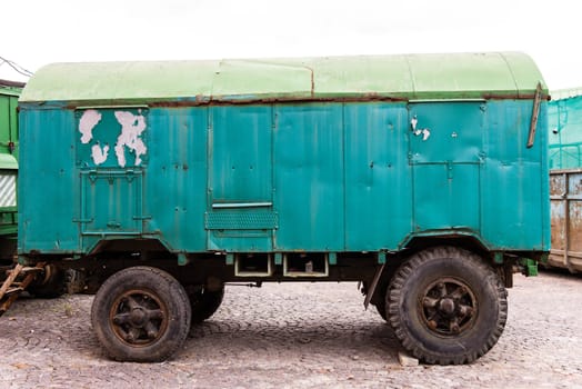 Very old rusty vintage truck trailer taken on a sunny day can be use for background