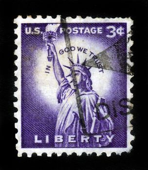 USA - CIRCA 1954: A stamp printed in USA, shows the Statue of Liberty, the inscription "in God We Trust", circa 1954.