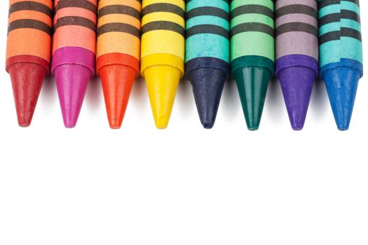 Colorful pencils over white background
