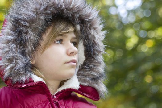 Portrait of a  young girl, warm autumn day