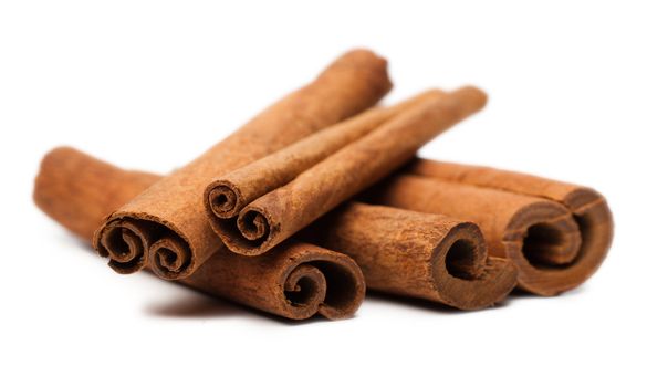 Cinnamon sticks spice isolated over white background