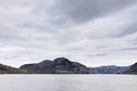 landscape in norway - coastline with cloudy sky