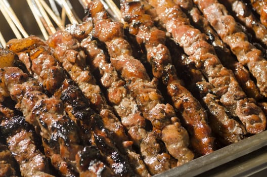 Stack of pork shishkabobs on serving tray