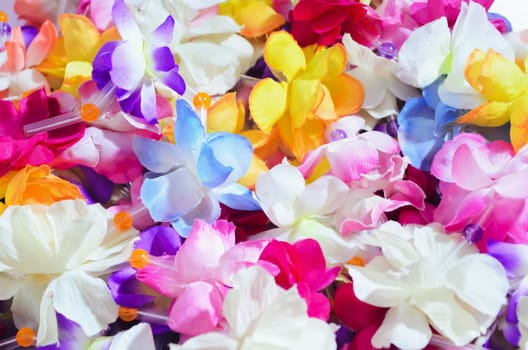 Close-up of garlands of flowers made of cloth