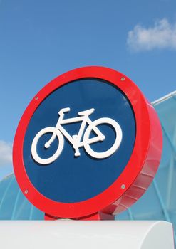Bike parking sign at bike rack located in an American city.







Bike parking sign