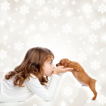 christmas snowflakes with children girl hugging a puppy brown dog