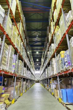 Indoor warehouse with lot of pallet. Wide angle photo.