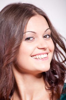beautiful brunette woman portrait with makeup and brown eyes