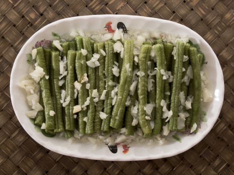 close up of a plate of stir fried long beans