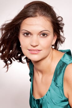 beautiful brunette woman portrait with makeup and brown eyes