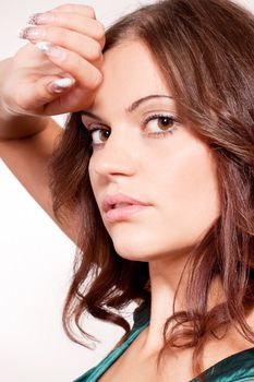 beautiful brunette woman portrait with makeup and brown eyes