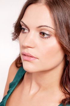 beautiful brunette woman portrait with makeup and brown eyes