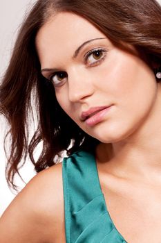 beautiful brunette woman portrait with makeup and brown eyes
