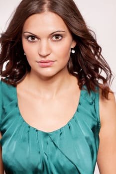 beautiful brunette woman portrait with makeup and brown eyes