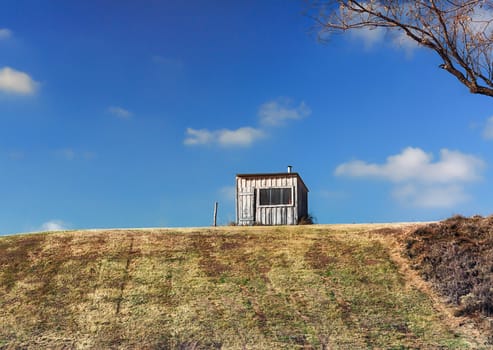 A Secluded Rural Shack at the Top of the Hill