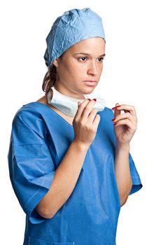 Young female surgeon getting ready for a surgery