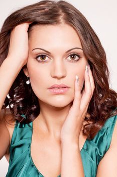 beautiful brunette woman portrait with makeup and brown eyes