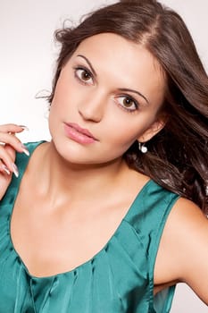 beautiful brunette woman portrait with makeup and brown eyes